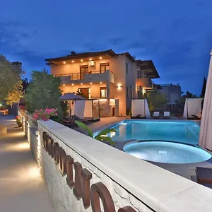 https://sinodinos-deluxe-apartments.hotelschalkidiki.net